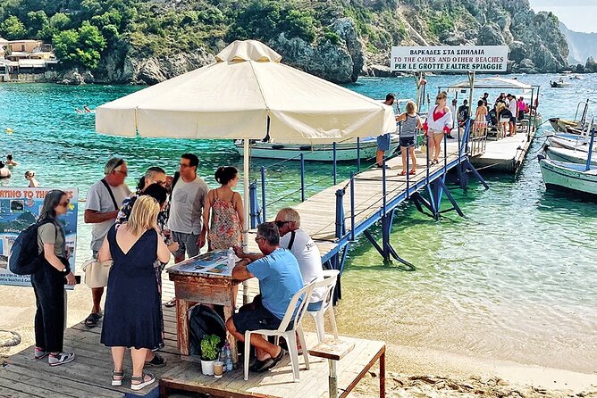 Bus Trip with Swim to Paleokastritsa and Olive Oil Museum - Makrades village: colorful houses, a cliff café pause
