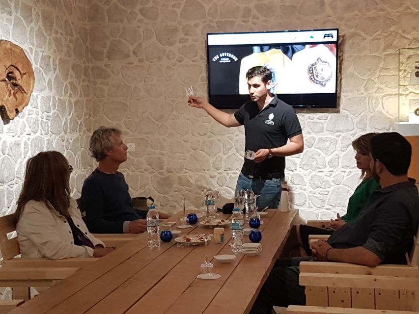 Corfu: Olive Oil Experience - The Governor's Olive Mill - Modern extraction area and the prizes wall