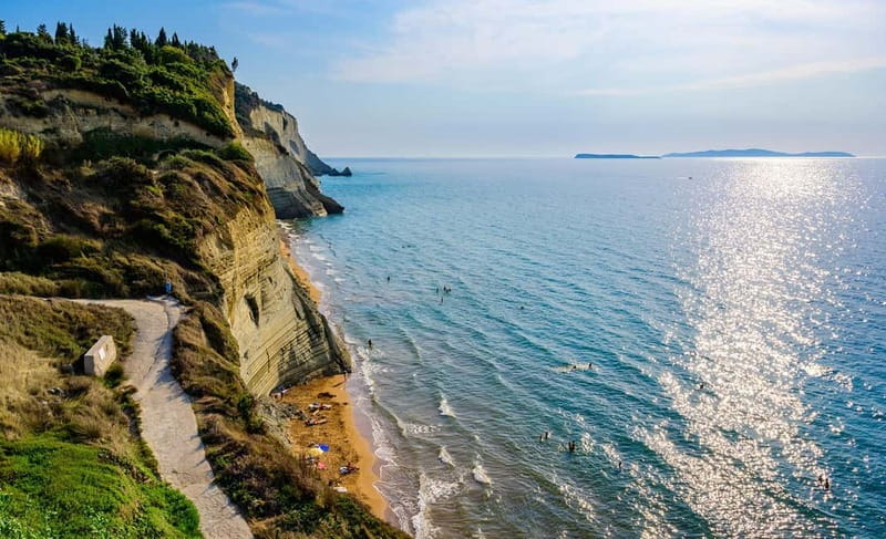 Corfu: Palaiokastritsa Swimming and Loggas Beach Sunset Tour - The drive to Loggas Beach and why sunset is planned here