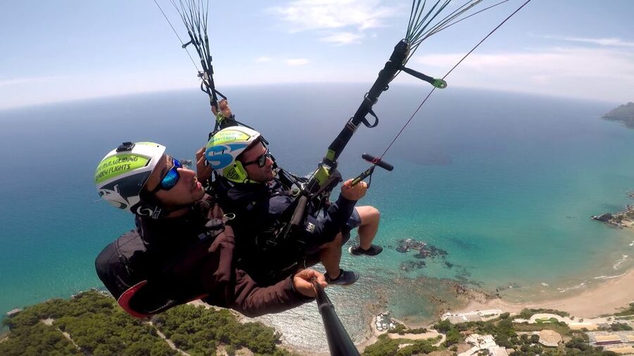 Corfu: Paragliding Tandem Flight Above Pelekas Town - Getting Started Near Giannades: Briefing, Seat Setup, and First Runs