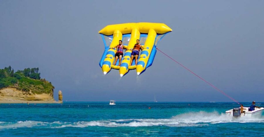 Corfu: Sidari Watersports Fly Fish tubing ride - Safety First: Briefing, Life Jackets, and the Banana Boat Step