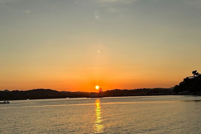 Corfu: Sunset Cruise on a Wooden Vessel with Cocktails & Bites - Garitsa Bay at Golden Hour for Photos and Calm Water