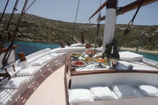Corfu: Sunset Cruise on a Wooden Vessel with Cocktails & Bites - Mouse Island (Pontikonisi): Myth, Church, and Sunset Stillness