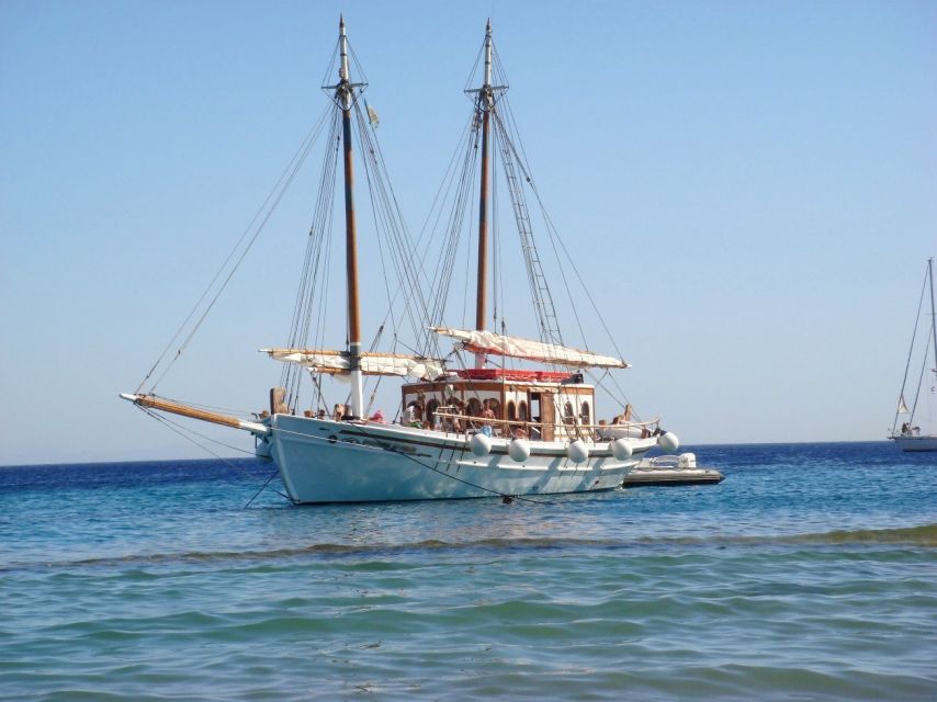 Corfu Town: Full-Day Cruise with Lunch, Drinks & Swim Stops - Peristeres Lighthouse and the final cove: views for photos and calmer water time