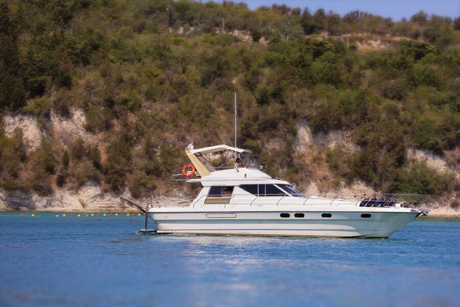 From Corfu: Luxury Yacht Cruise to Paxos and Antipaxos - Lakka Beach sightseeing: clear water and a calmer start