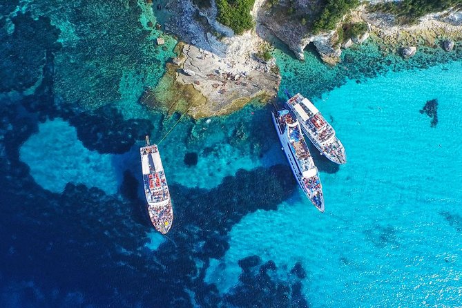 Paxos Antipaxos Blue Caves Day Tour from Corfu - Mesovrika Beach: swimming and snorkeling time in turquoise water